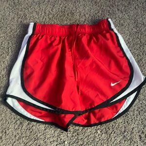 Red Nike shorts athletic women’s